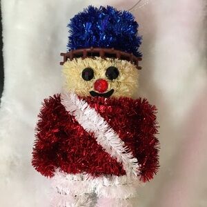 Festive Soldier Ornament with Red and Blue Tinsel